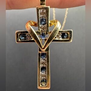 Elegant Gold, Diamond and Sapphire Cross Pendant. Cross is 10k gold.